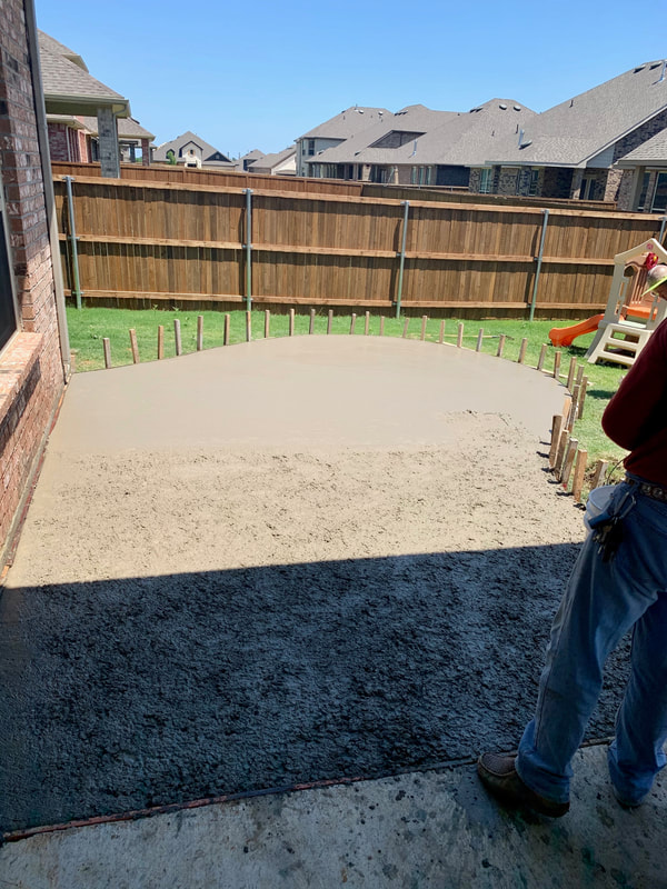 Arlington resident rounded concrete patio extension